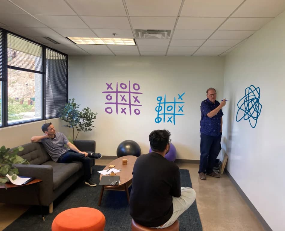 TheRecordXchange team at work in the office.