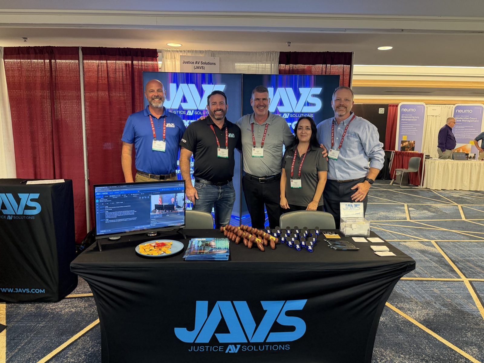 The TheRecordXchange and JAVS teams together at the NACM Annual Conference exhibit floor