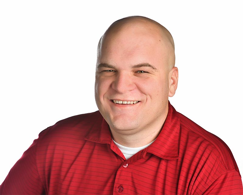 Heads up photograph of team member Brandon.